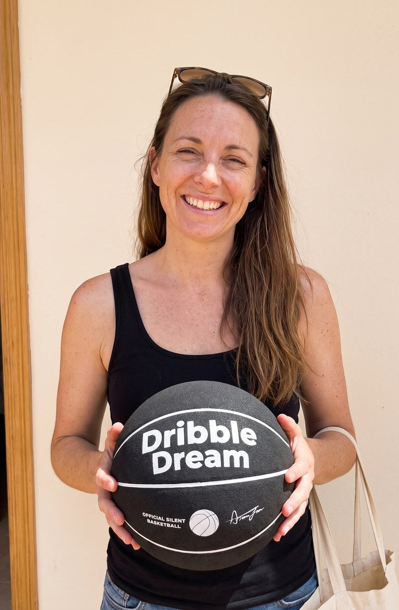 AI preview image, not a customer photo: woman holding the black Dribble Dream silent basketball